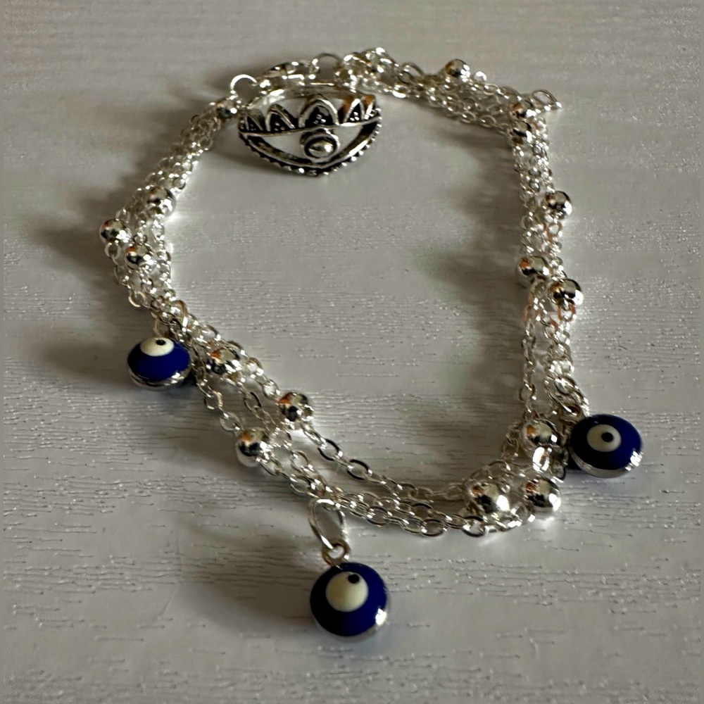 Free with purchase Silver tone Evil Eye Bracelet and ring